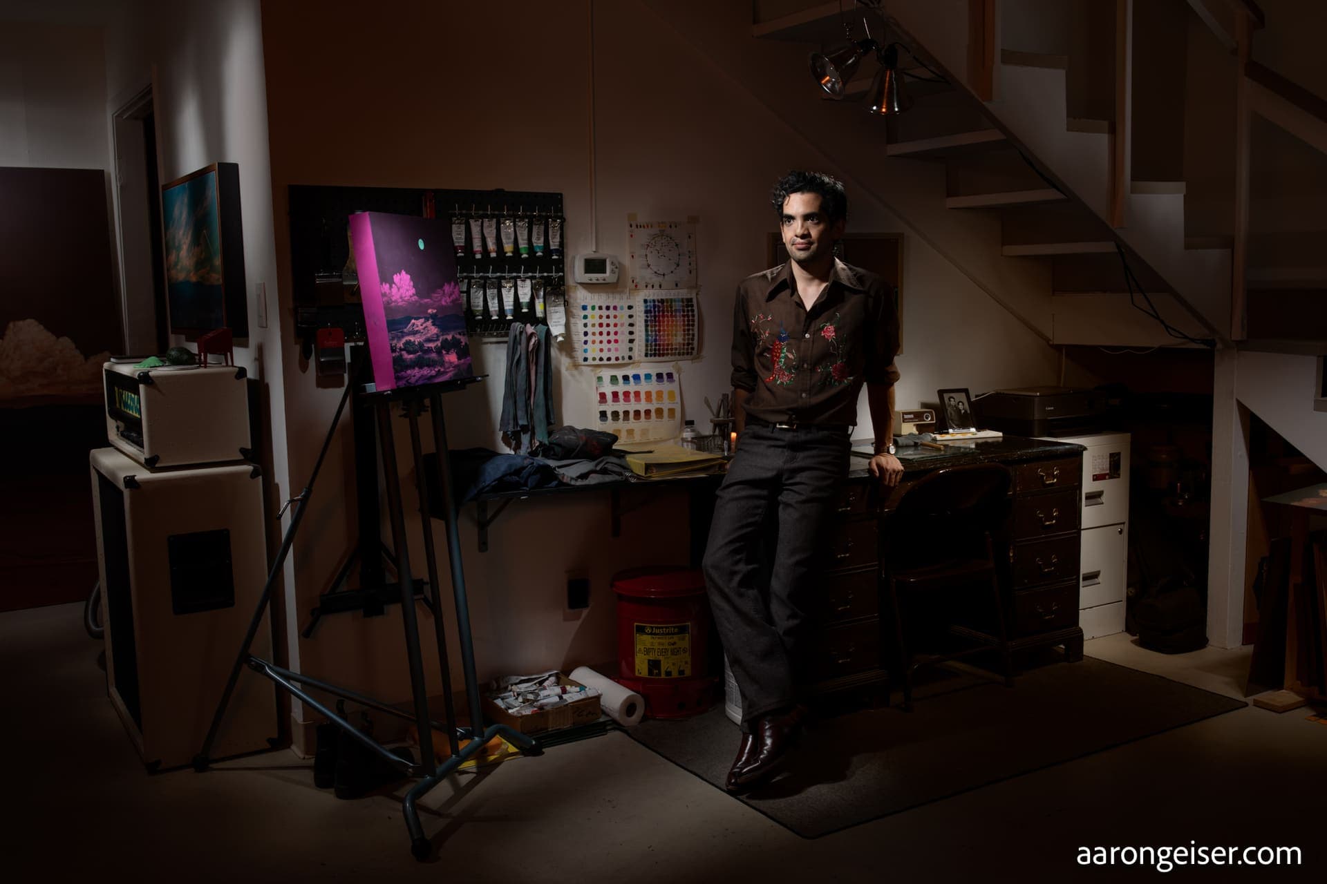 Jake Trujillo, fine art oil painter, in his studio in Santa Fe, New Mexico.