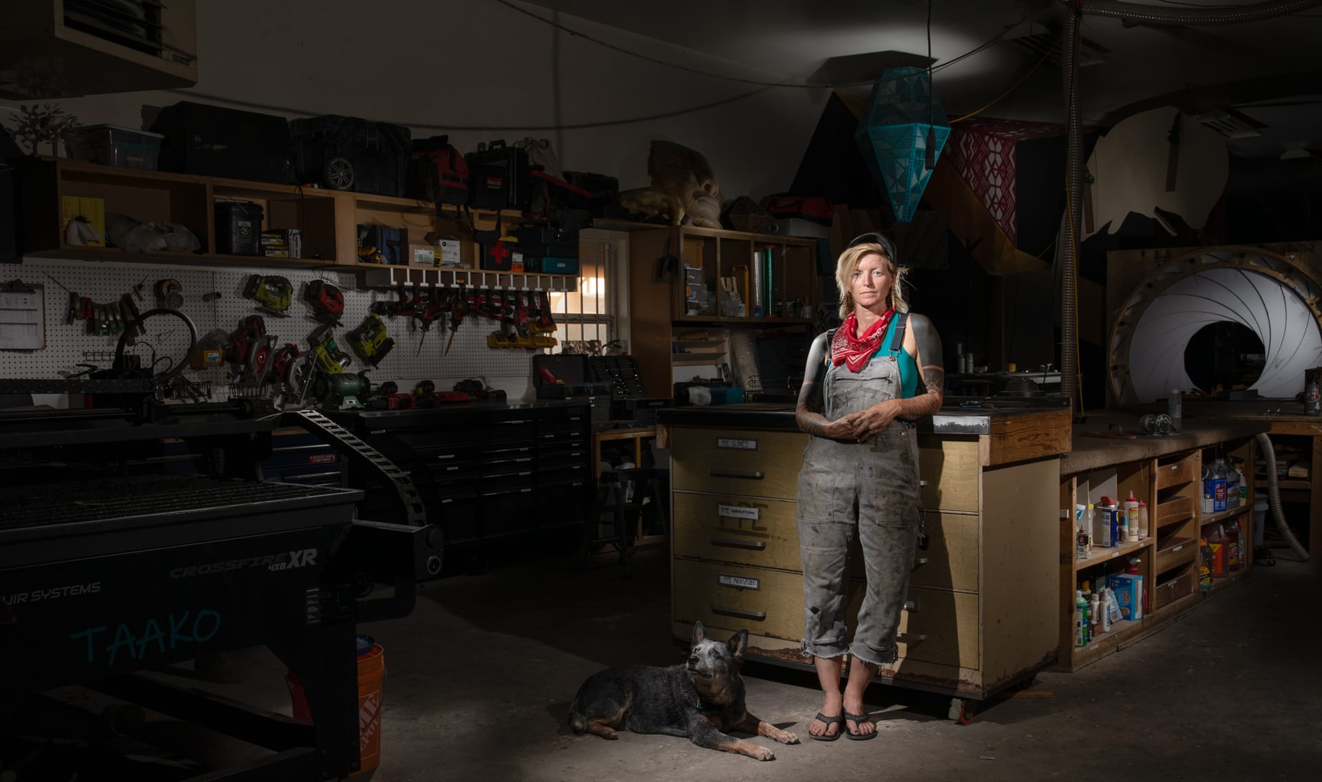 Light painting portrait of Calli Beck in her studio at Stark Raven Fabrication in Santa Fe, New Mexico